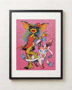 Greta & Sylveon — Pretty in Pink Gremlins crossover art print framed in a black frame with white mat