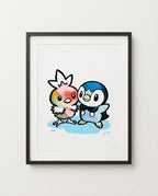 Torchic & Piplup — Puddle Pals watercolour art print framed in a black frame with white mat